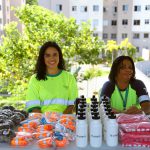 Equipe Arteris e material distribuído durante a ação