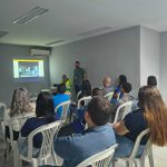 Colaboradores da empresa durante a palestra