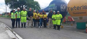Equipe e parceiros na ação